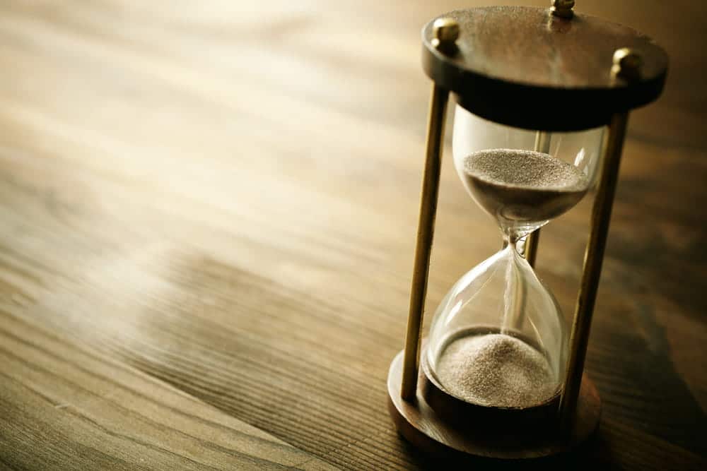 Image is of an hourglass with sand running through it, concept of time passing during a DUI case process