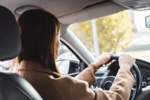 Image is of a driver behind the wheel of a vehicle, representing the restoration of driving privileges after a DUI in Ponte Vedra Beach.