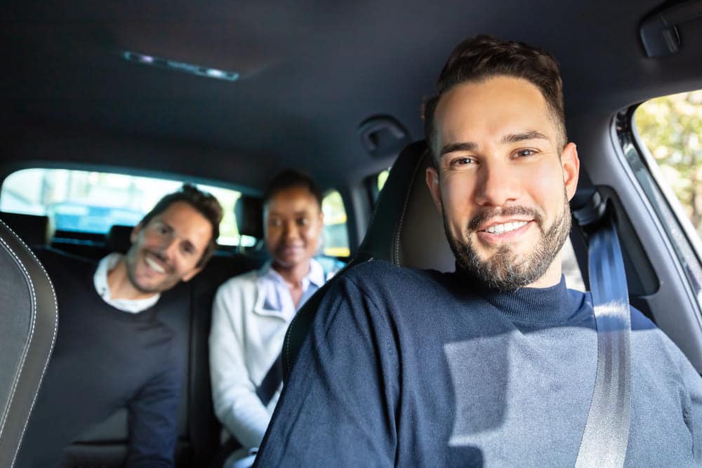Image is of several people traveling together in a vehicle, concept of a drug arrest involving multiple occupants in a shared car.