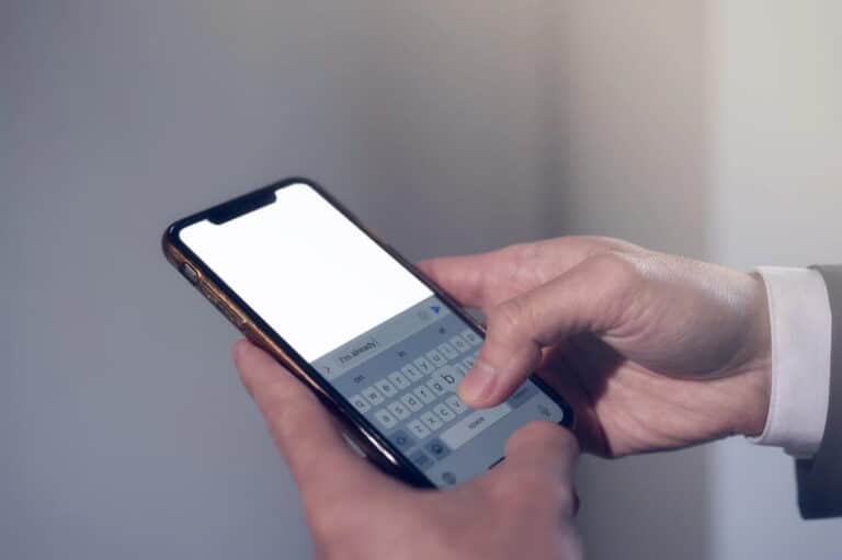 Image of a person typing a text message on a smartphone, illustrating communication concerns following a DV Arrest in Ponte Vedra Beach.